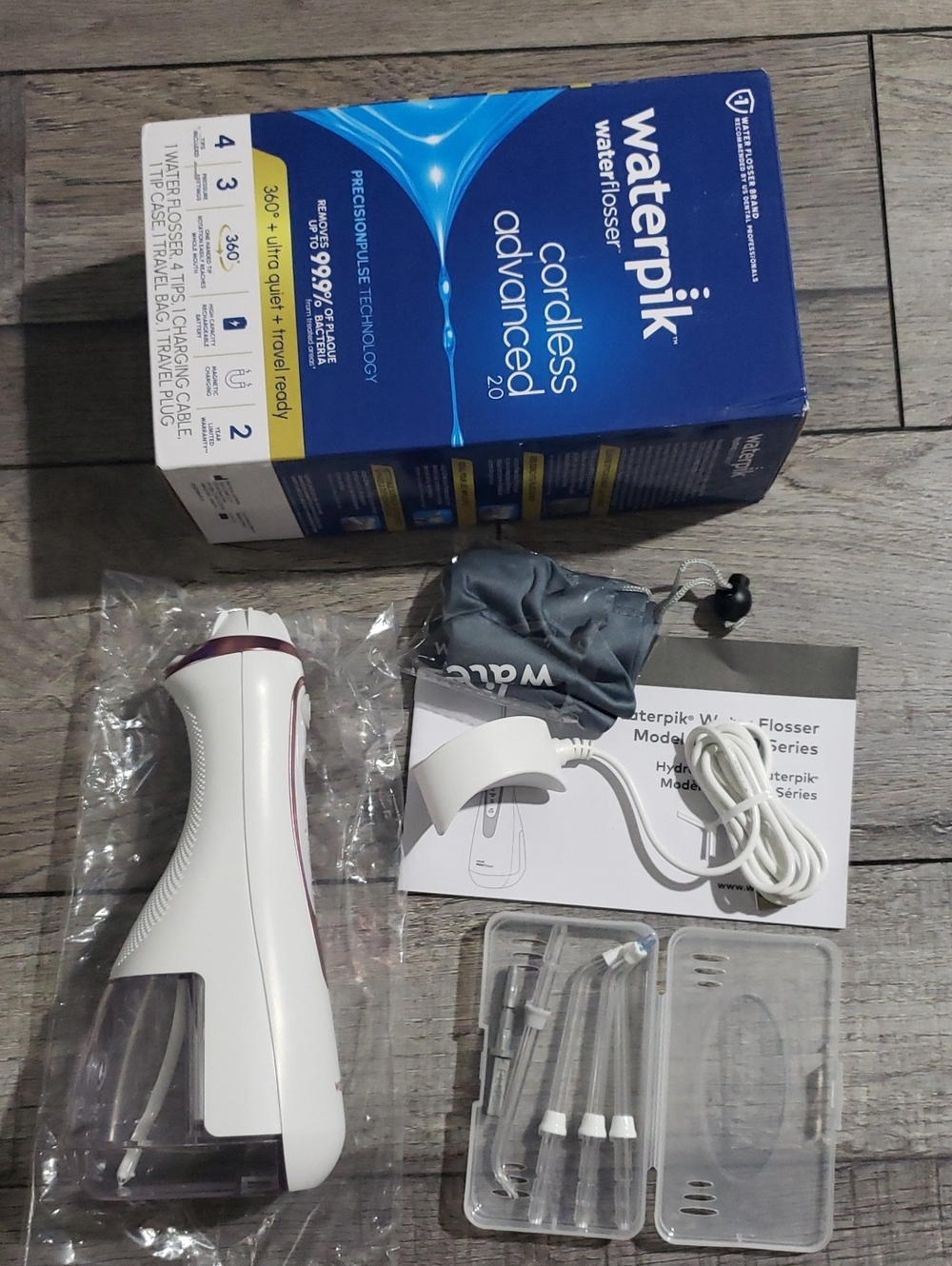 Waterpik Cordless Advanced Portable Water Flosser Rechargeable Rose Gold WP-589C